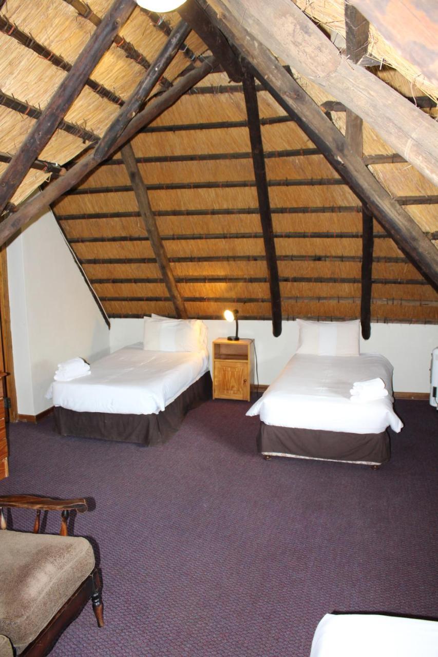 Dragon Peaks Mountain Resort Champagne Valley Экстерьер фото